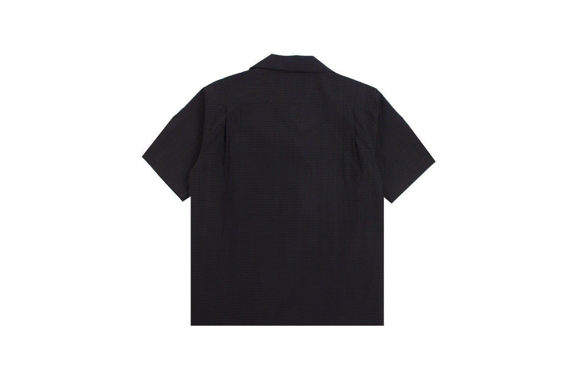 Prada Short-sleeve Button-up Shirt - Black Unisex Streetwear Limited Edition - <p dir='ltr'><span>Black short-sleeve button-up shirt with a subtle checkered pattern. Features a front pocket