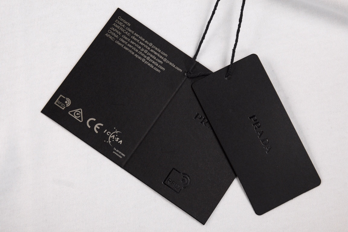 Prada Logo Pocket T-shirt (white) Unisex Streetwear Limited Edition - <span>Classic white t-shirt featuring a subtle Prada logo on the chest pocket. Made from high-quality