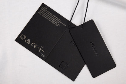 Prada Logo Pocket T-shirt (white) Unisex Streetwear Limited Edition - <span>Classic white t-shirt featuring a subtle Prada logo on the chest pocket. Made from high-quality