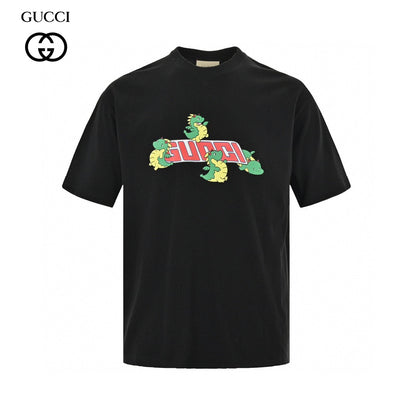 Gucci T-shirt With Dinosaur Graphic - Black Unisex Streetwear Limited Edition - <span>Fun and trendy. Features colorful dinosaur cartoons. Gucci logo in the center. Made from high-quality