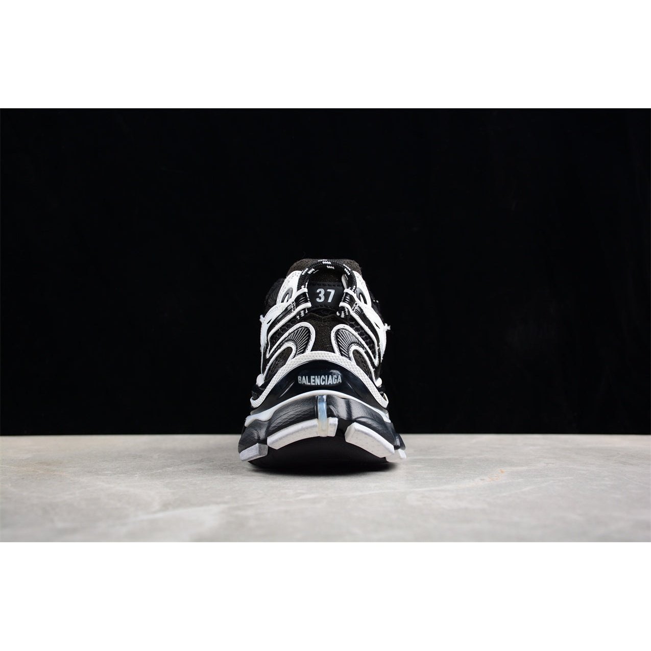 BALENCIAGA Runner - White Sneakers - Black Unisex Streetwear Limited Edition - The BALENCIAGA Runner x Black White sneakers exude a sleek and timeless elegance, perfect for