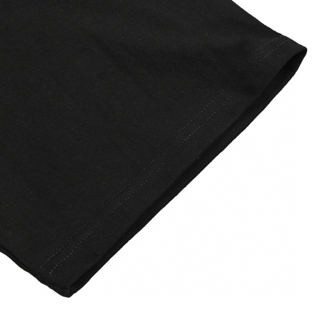 Camiseta negra de Gucci con estampado de dinosaurio rosa