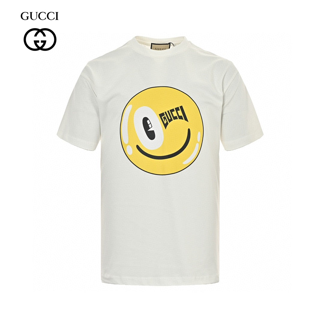 Gucci Smiley Face T-shirt - Yellow Unisex Streetwear Limited Edition - <span>This Gucci t-shirt features a playful design with a large yellow smiley face graphic on