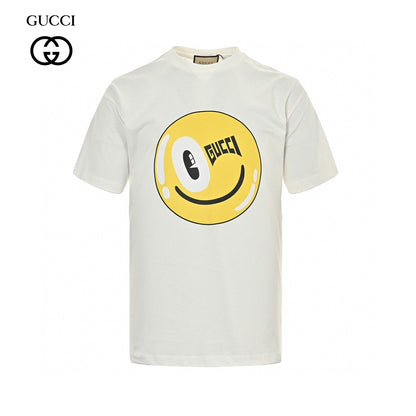 Gucci Smiley Face T-shirt - Yellow Unisex Streetwear Limited Edition - <span>This Gucci t-shirt features a playful design with a large yellow smiley face graphic on