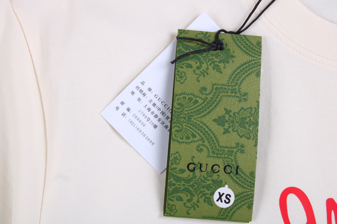 Camiseta Gucci con estampado de setas (Crema)