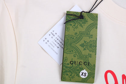 Camiseta Gucci con estampado de setas (Crema)