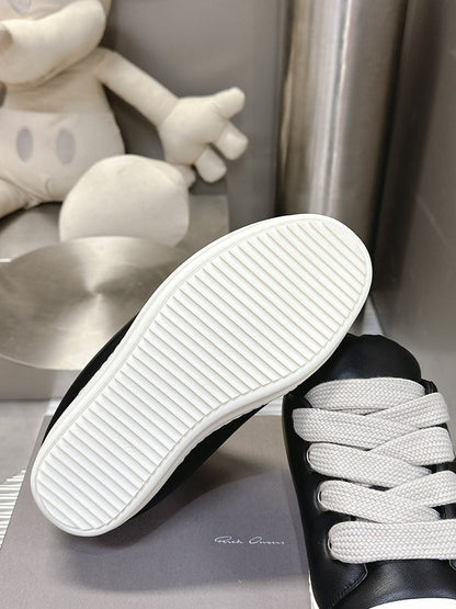 Rick Owens Low-top Sneakers - Black Unisex Streetwear Limited Edition - **Rick Owens Black Low-Top Sneakers: Avant-Garde Elegance and Comfort** Step into the future of fashion