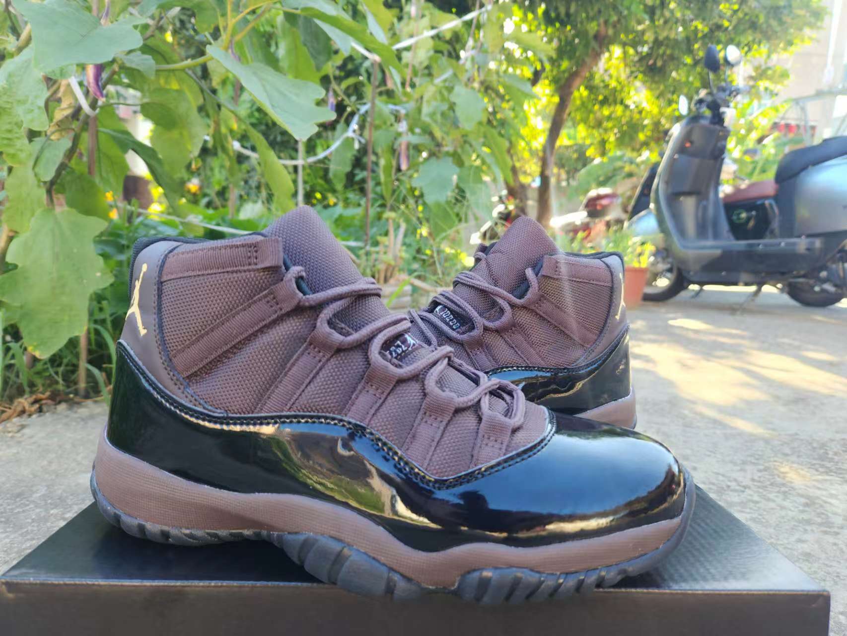 JORDAN 11 Sneakers - Brown Unisex Streetwear Limited Edition - The sneaker shown is another exceptional iteration of the Air Jordan 11, showcasing a sophisticated