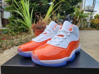 JORDAN 11 Orange And - White Unisex Streetwear Limited Edition - The Air Jordan 11 in White, Orange, and Red is a striking addition to the