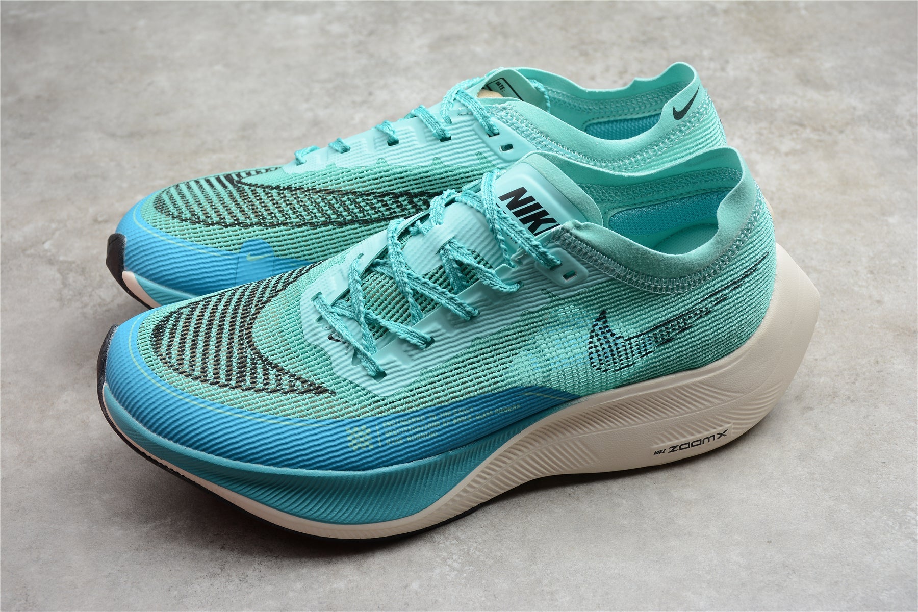 Zoom - Vaporfly Ne - T% 2 Turquoise And - White Unisex Streetwear Limited Edition - ### Nike ZoomX Vaporfly NEXT% 2 The Nike ZoomX Vaporfly NEXT% 2 is designed for
