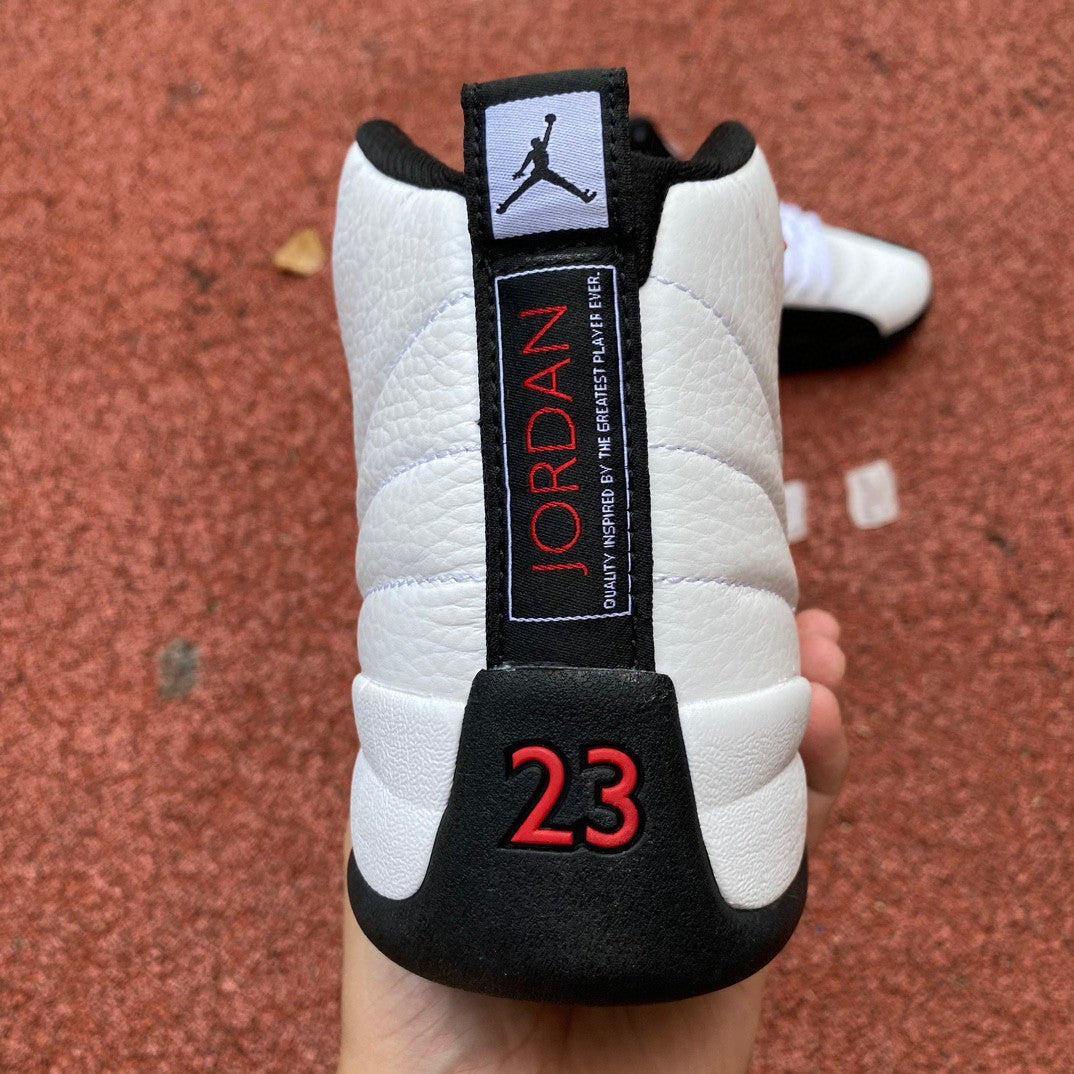 Jordan 12 Retro 'white - - Red' Sneakers - Black Unisex Streetwear Limited Edition - **Product Description: Air Jordan 12 Retro 'White/Black/Red'** The Air Jordan 12 Retro 'White/Black/Red' is a