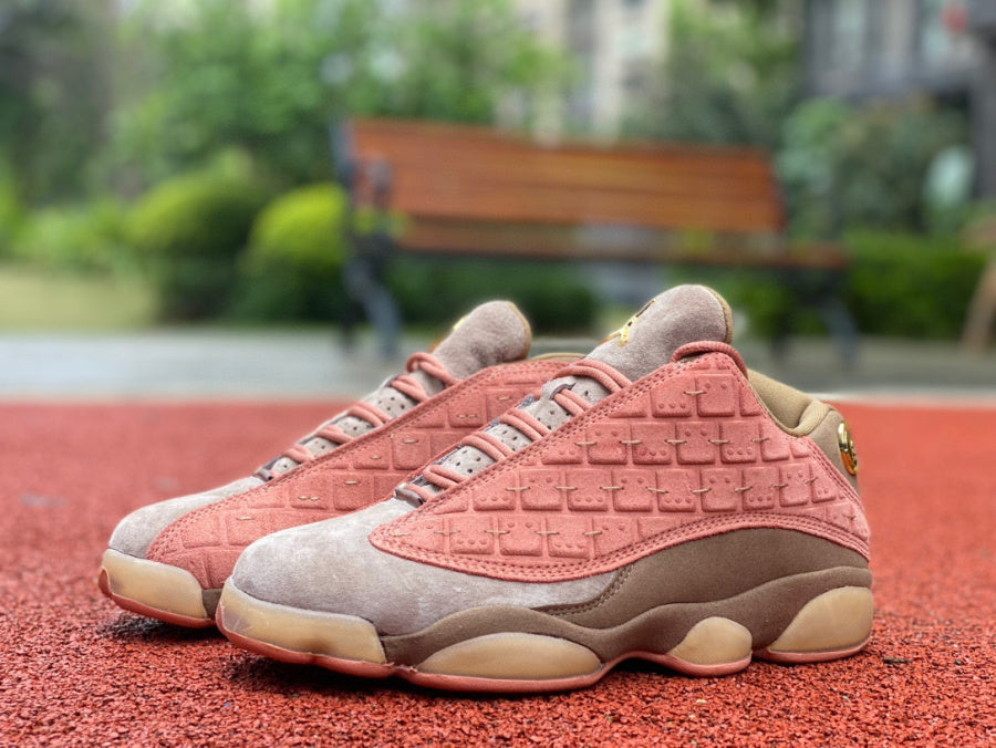 Jordan 13 - Pink Unisex Streetwear Limited Edition - The Air Jordan 13 Low featured here is a striking blend of textures and tones,