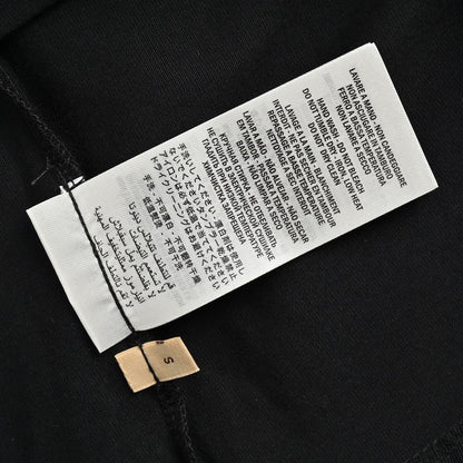 Camiseta Gucci con logo salpicado (negra)