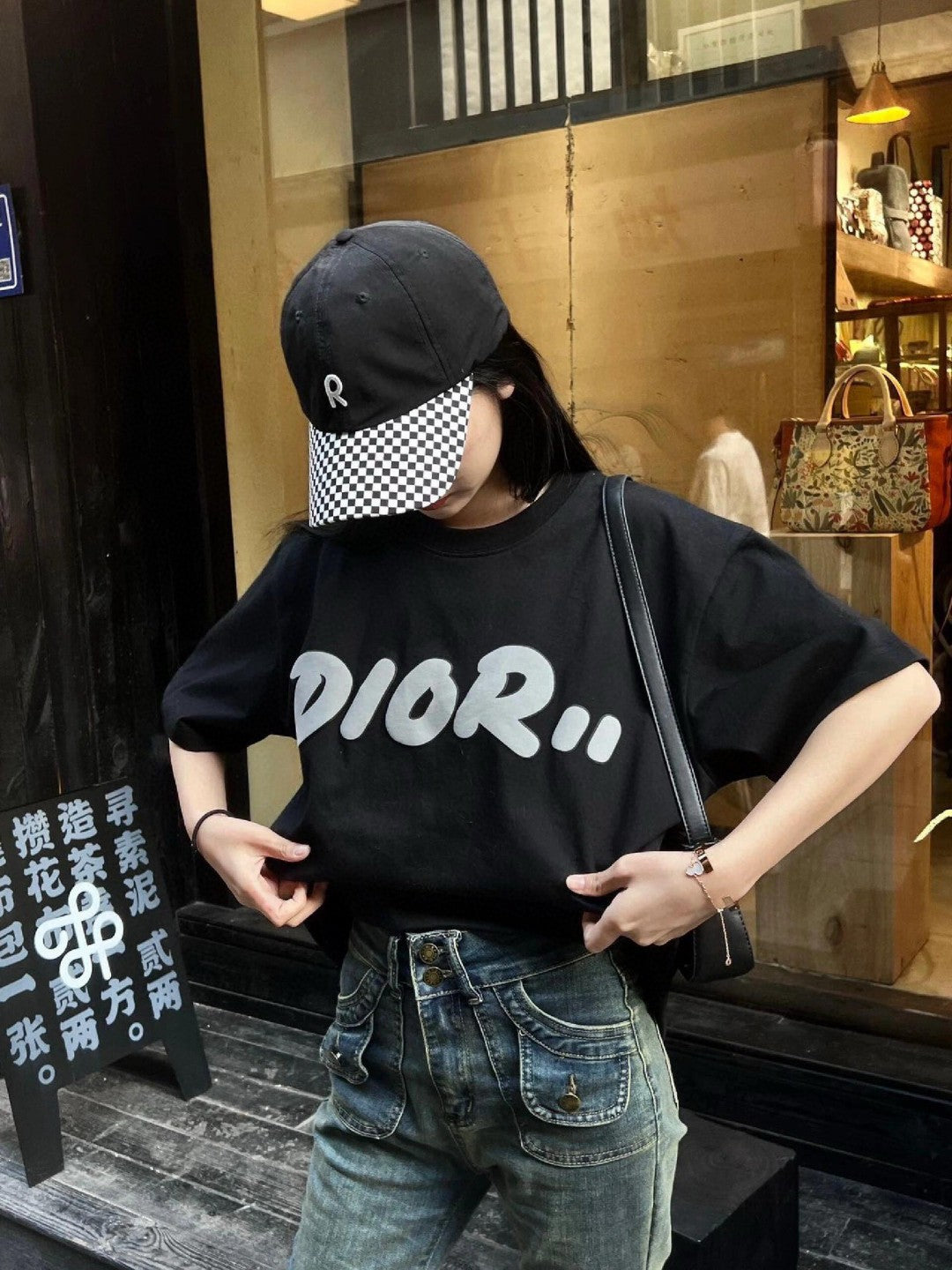 Dior Oversized White Logo T-shirt - Black Unisex Streetwear Limited Edition - This Dior t-shirt features a bold oversized 'Dior' logo in white on the front. The