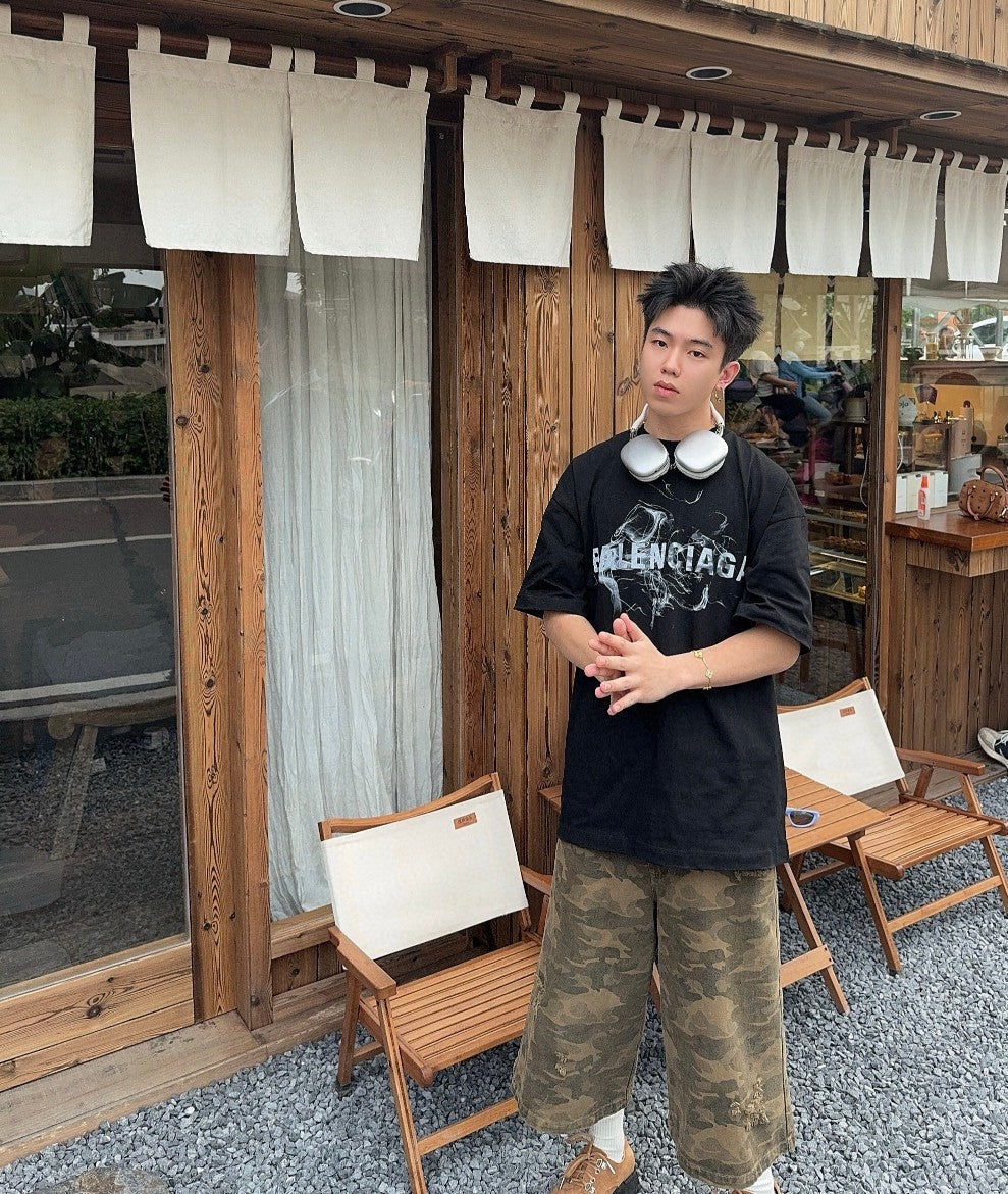 Camiseta Balenciaga con logo estampado ahumado (negra)