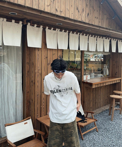 Camiseta Balenciaga con logo estampado ahumado (blanca)