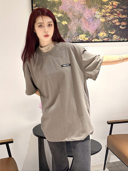 Camiseta con el logo de Fear of God Essentials - Color topo