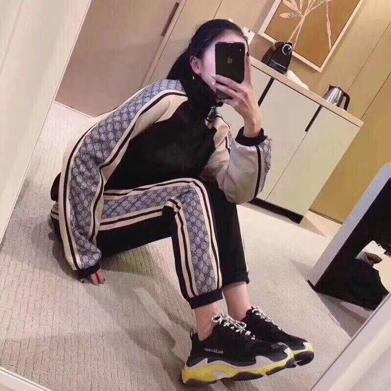 Chaqueta deportiva Gucci GG Supreme con rayas - Negra