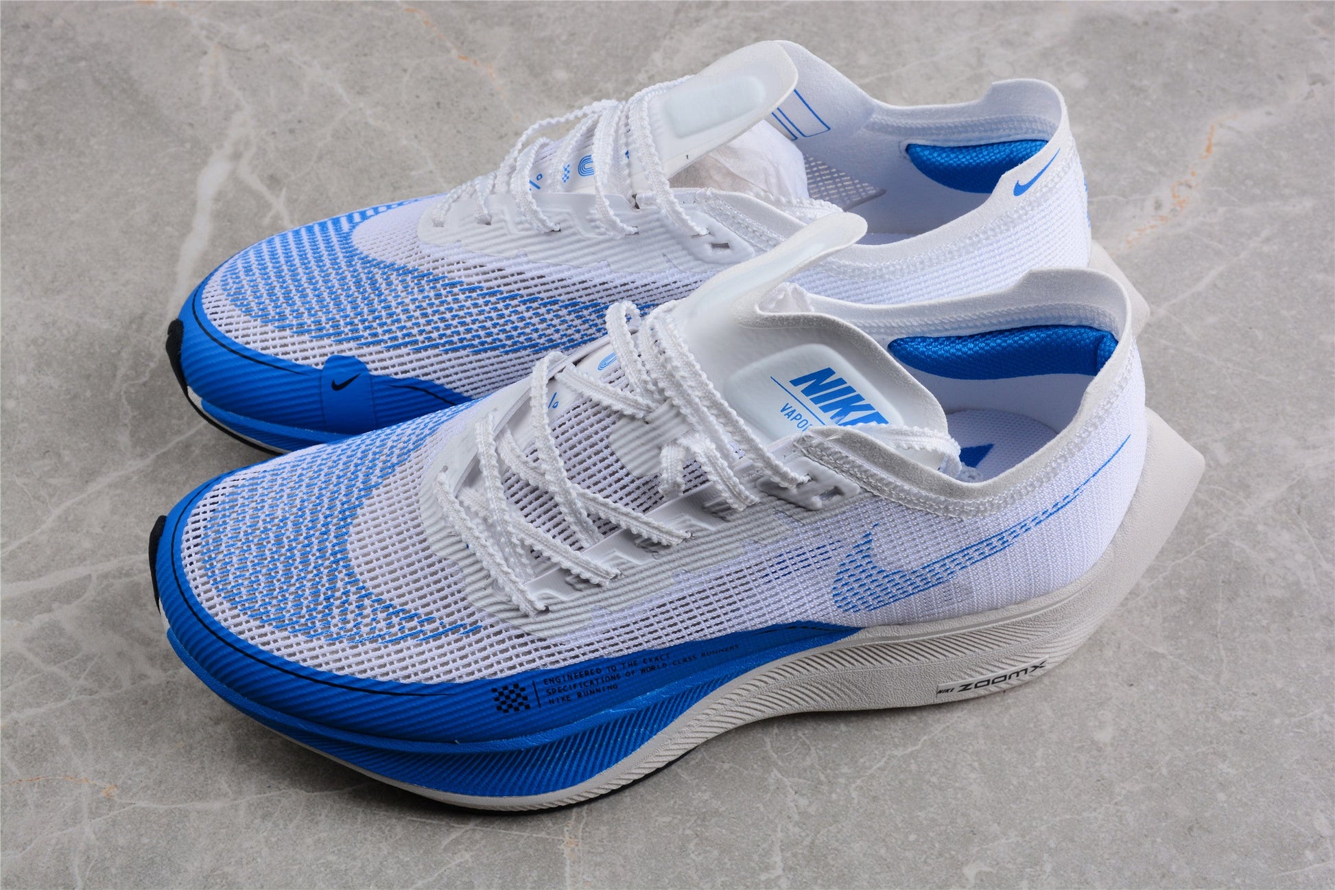 Zoom - Vaporfly Ne - T% 2 And Blue - White Unisex Streetwear Limited Edition - ### Nike ZoomX Vaporfly NEXT% 2 The Nike ZoomX Vaporfly NEXT% 2 is crafted for