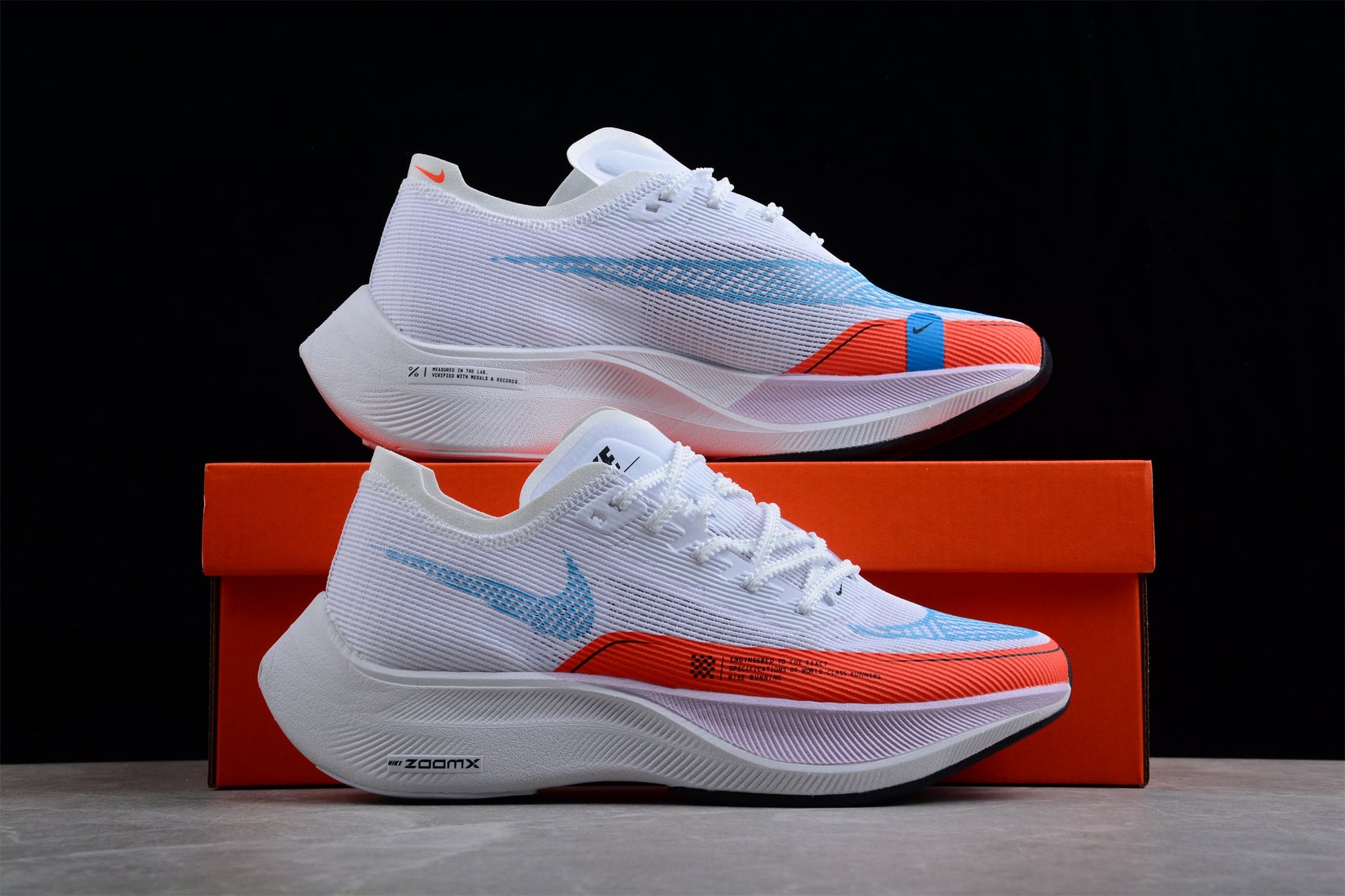 Zoom - Vaporfly Ne - T% 2 And Orange - White Unisex Streetwear Limited Edition - The Nike ZoomX Vaporfly NEXT% 2 is a high-performance running shoe designed for elite runners.