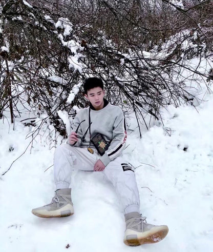 Sudadera gris Gucci con detalle de rayas