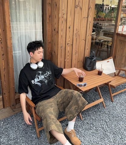 Camiseta Balenciaga con logo estampado ahumado (negra)