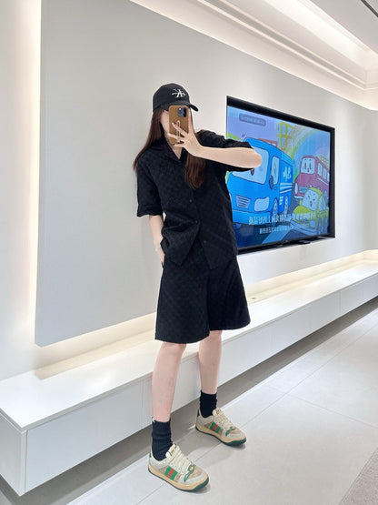 Camisa negra de manga corta con monograma GG de Gucci