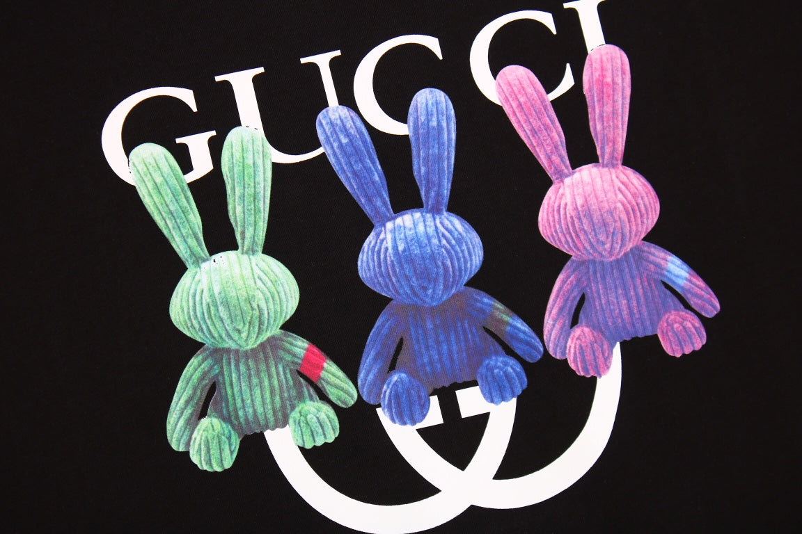 Gucci Bunny Trio T-shirt (black) Unisex Streetwear Limited Edition - This Gucci t-shirt features a playful design with three colorful bunnies. The bunnies are displayed
