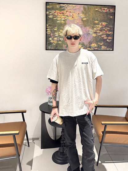 Camiseta con el logo de Fear of God Essentials - Gris jaspeado