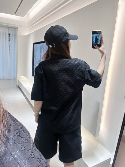 Camisa negra de manga corta con monograma GG de Gucci