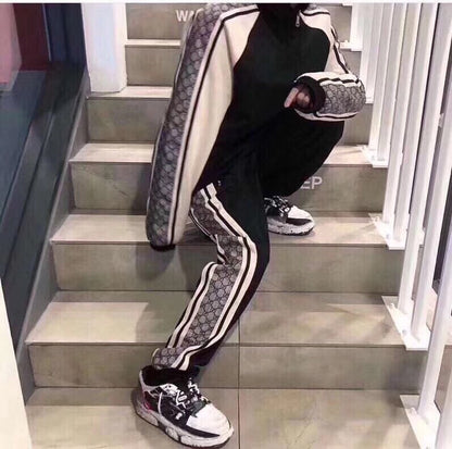 Chaqueta deportiva Gucci GG Supreme con rayas - Negra