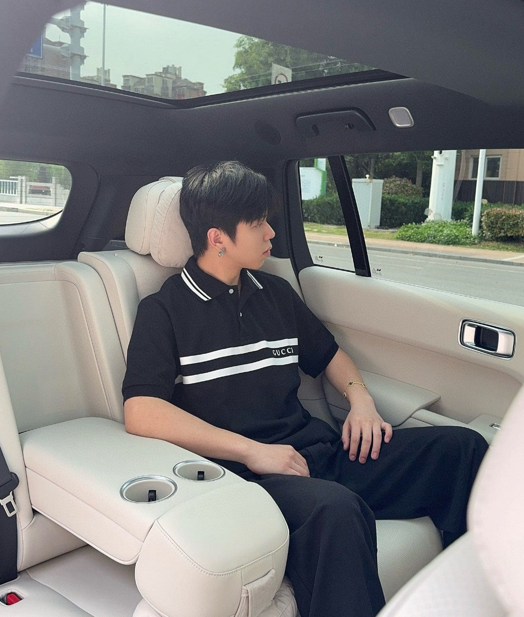 Polo à logo rayé Gucci (noir)