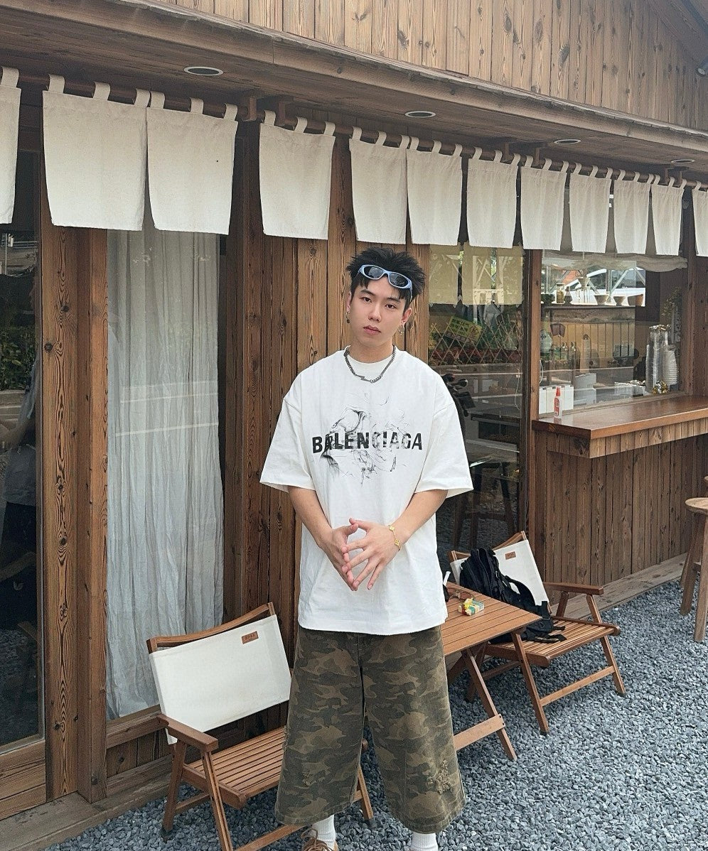 Camiseta Balenciaga con logo estampado ahumado (blanca)