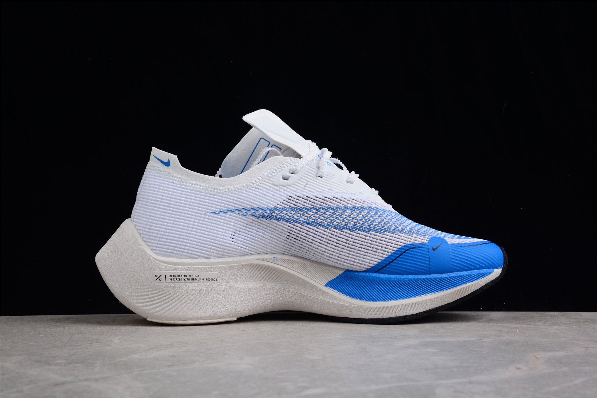 Zoom - Vaporfly Ne - T% 2 And Blue - White Unisex Streetwear Limited Edition - ### Nike ZoomX Vaporfly NEXT% 2 The Nike ZoomX Vaporfly NEXT% 2 is crafted for