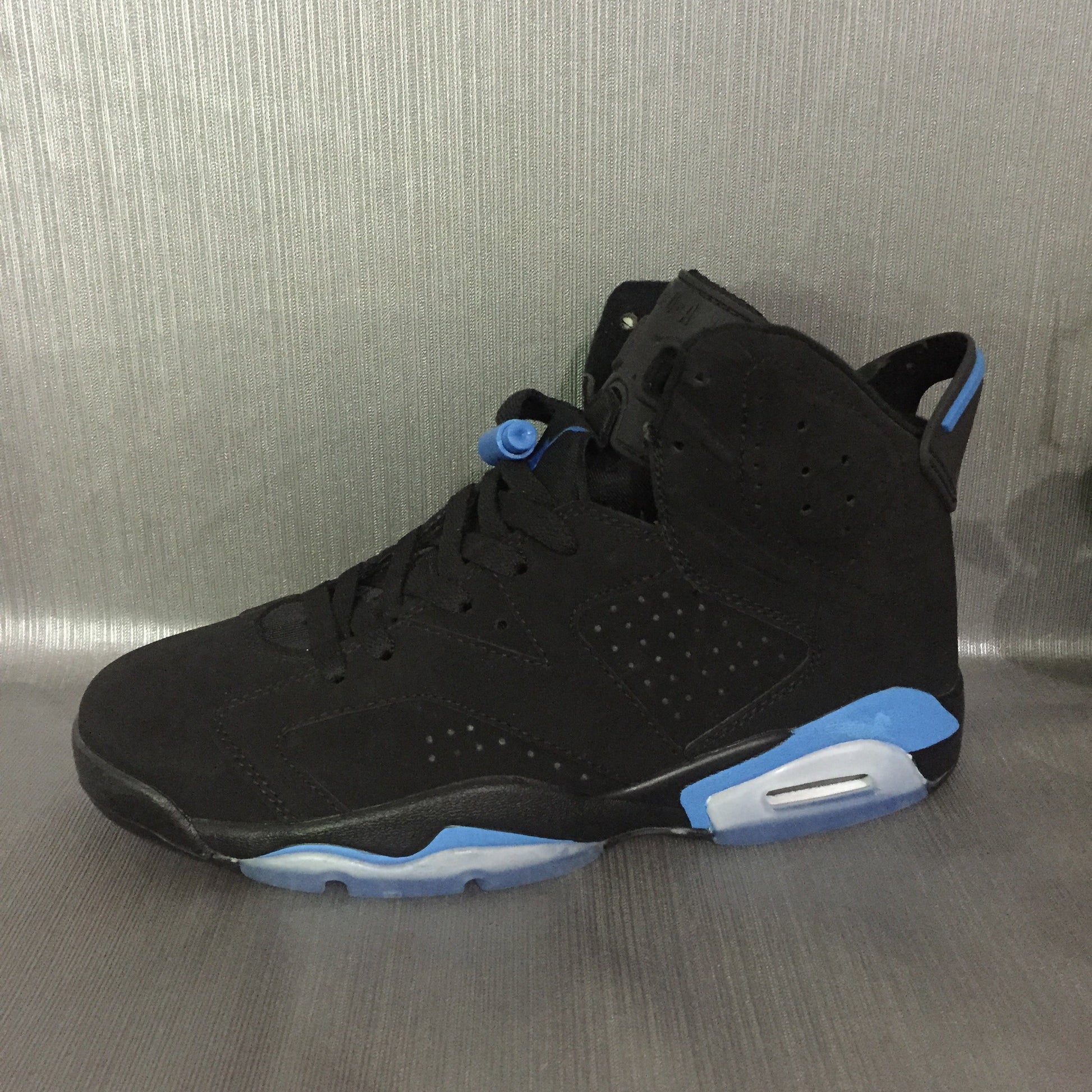 Jordan 6 Retro 'black University Blue' Unisex Streetwear Limited Edition - Introducing the Air Jordan 6 Retro 'Black University Blue,' a sneaker that masterfully blends classic