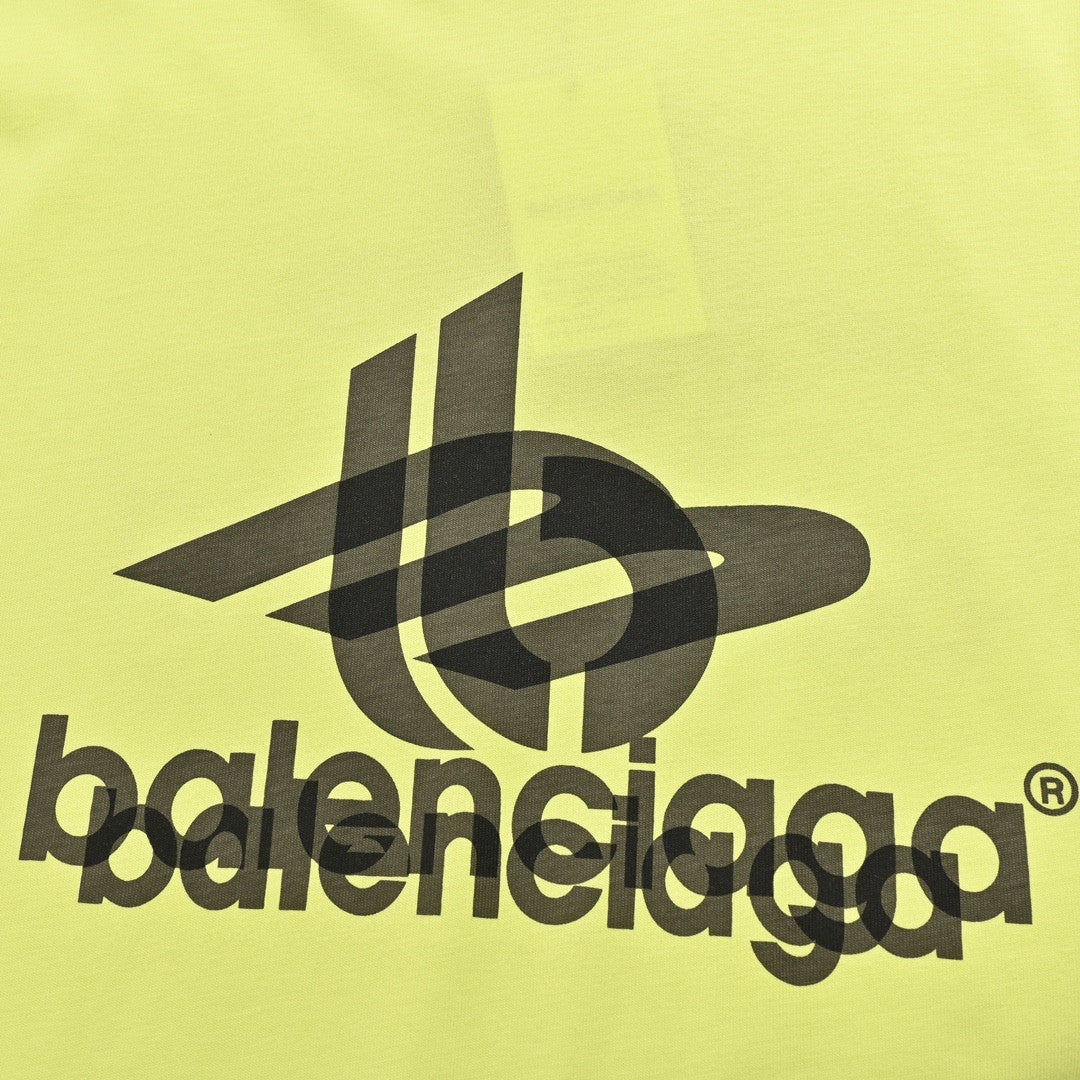 Balenciaga T-shirt - Overlapping Logo - Black Unisex Streetwear Limited Edition - <span>This Balenciaga t-shirt features a vibrant neon yellow color that makes a bold statement. The