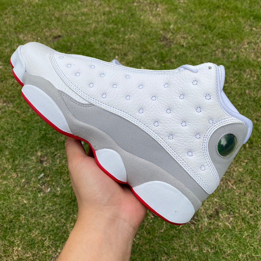 Jordan 13 Retro 'history Of Flight' - White Unisex Streetwear Limited Edition - The Air Jordan 13 Retro 'History of Flight' is a striking blend of classic design