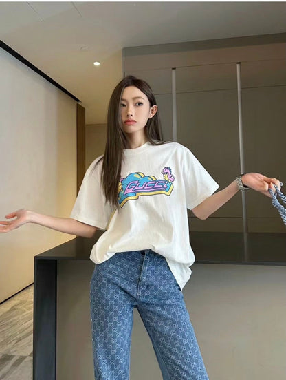Gucci T-shirt With Pink Dinosaur Graphic - White Unisex Streetwear Limited Edition - <span>Fun and trendy. Features colorful pink dinosaur cartoons. Gucci logo in the center. Made from