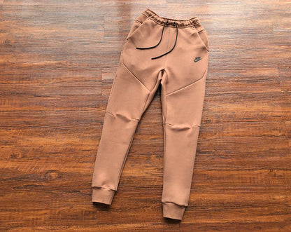 NIKE Tech Fleece Pants - Archeo - Brown Unisex Streetwear Limited Edition - The NIKE TECH FLEECE PANTS ARCHEO BROWN - REPLICA blend modern sportswear innovation with a