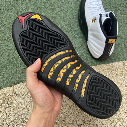 Jordan 12 Ta - I - Black Unisex Streetwear Limited Edition - Introducing the Air Jordan 12 Retro 'Royalty Taxi,' a luxurious twist on the iconic 'Taxi'