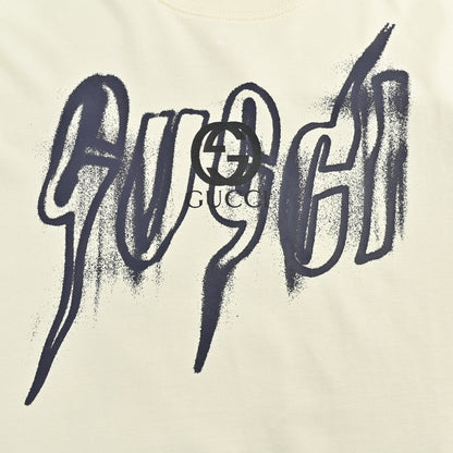 Gucci Graphic T-shirt - Cream Unisex Streetwear Limited Edition - <span>This Gucci t-shirt features a striking graphic design with the Gucci logo displayed in a