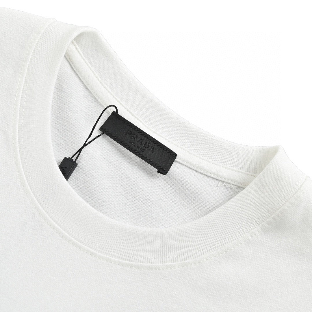 Prada T-shirt - With Subtle Branding - White Unisex Streetwear Limited Edition - <span>This Prada t-shirt features a clean white base with subtle 'PRADA MILANO' branding across the