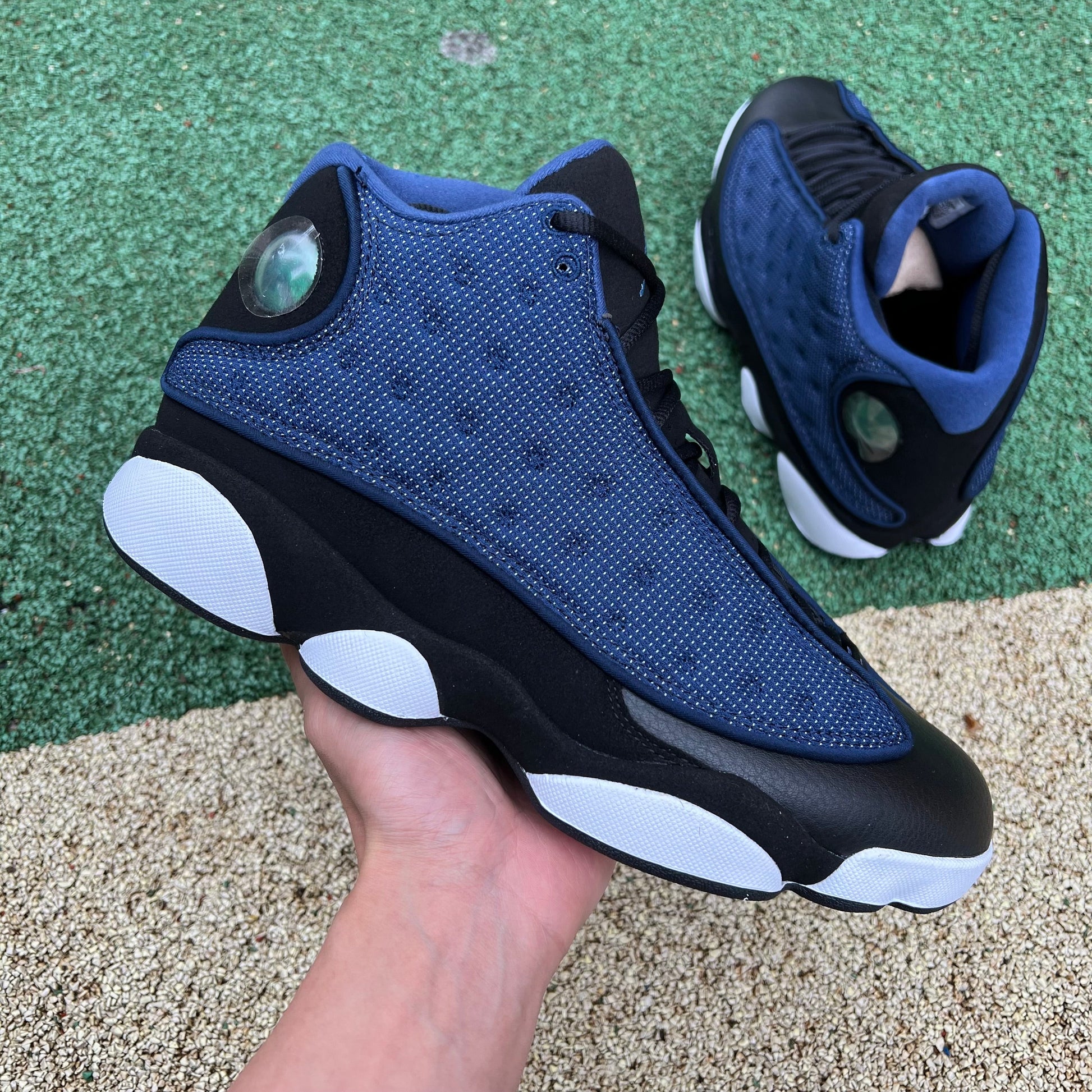 Jordan 13 Retro 'brave Blue' Sneakers Unisex Streetwear Limited Edition - The sneakers shown are the Air Jordan 13 Retro 'Navy,' also known as 'Brave Blue.'