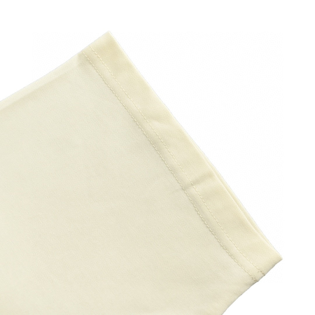 Camiseta color crema con gráfico de Gucci