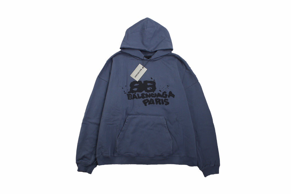 Balenciaga Paris Graffiti Hoodie - - Blue Unisex Streetwear Limited Edition - This blue Balenciaga hoodie features a bold graffiti-style graphic with the 'Balenciaga Paris' logo on
