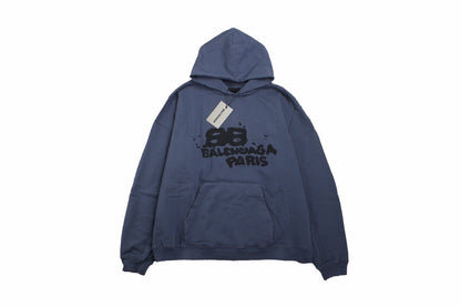 Balenciaga Paris Graffiti Hoodie - - Blue Unisex Streetwear Limited Edition - This blue Balenciaga hoodie features a bold graffiti-style graphic with the 'Balenciaga Paris' logo on