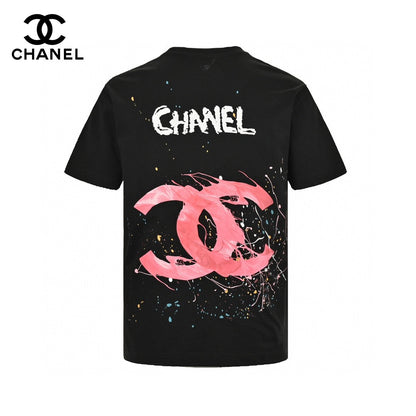 Chanel Pink Splash Logo T-shirt - Black Unisex Streetwear Limited Edition - This Chanel t-shirt features a large pink logo with a splash paint effect, complemented by