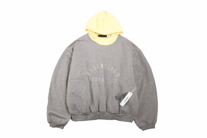 Fear Of God Essentials Hoodie - Grey With Hood - Yellow Unisex Streetwear Limited Edition - This grey Fear of God Essentials hoodie features a subtle 'ESSENTIALS FEAR OF GOD' logo