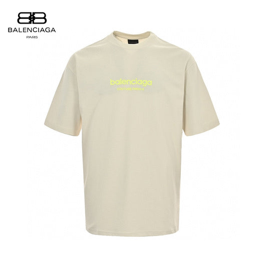 Balenciaga T-shirt - Yellow Unisex Streetwear Limited Edition - This Balenciaga t-shirt features a minimalist cream design. The front is adorned with the Balenciaga