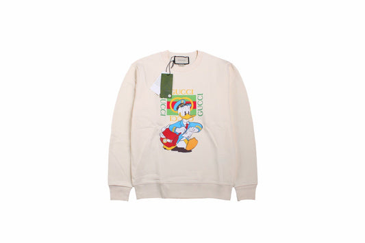 Gucci Donald Duck Sweatshirt - - Cream Unisex Streetwear Limited Edition - This cream-colored Gucci sweatshirt features a playful graphic of Donald Duck paired with the iconic